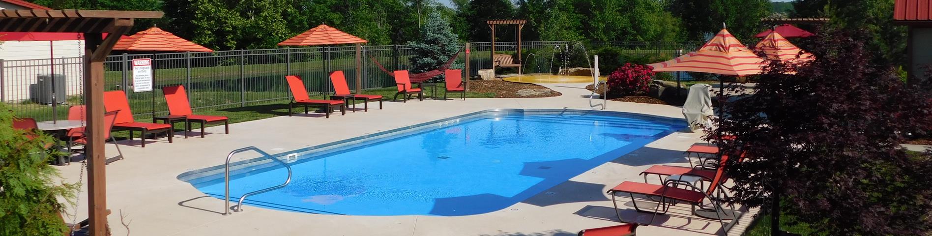 pool-with-red-lounge-chairs.jpg